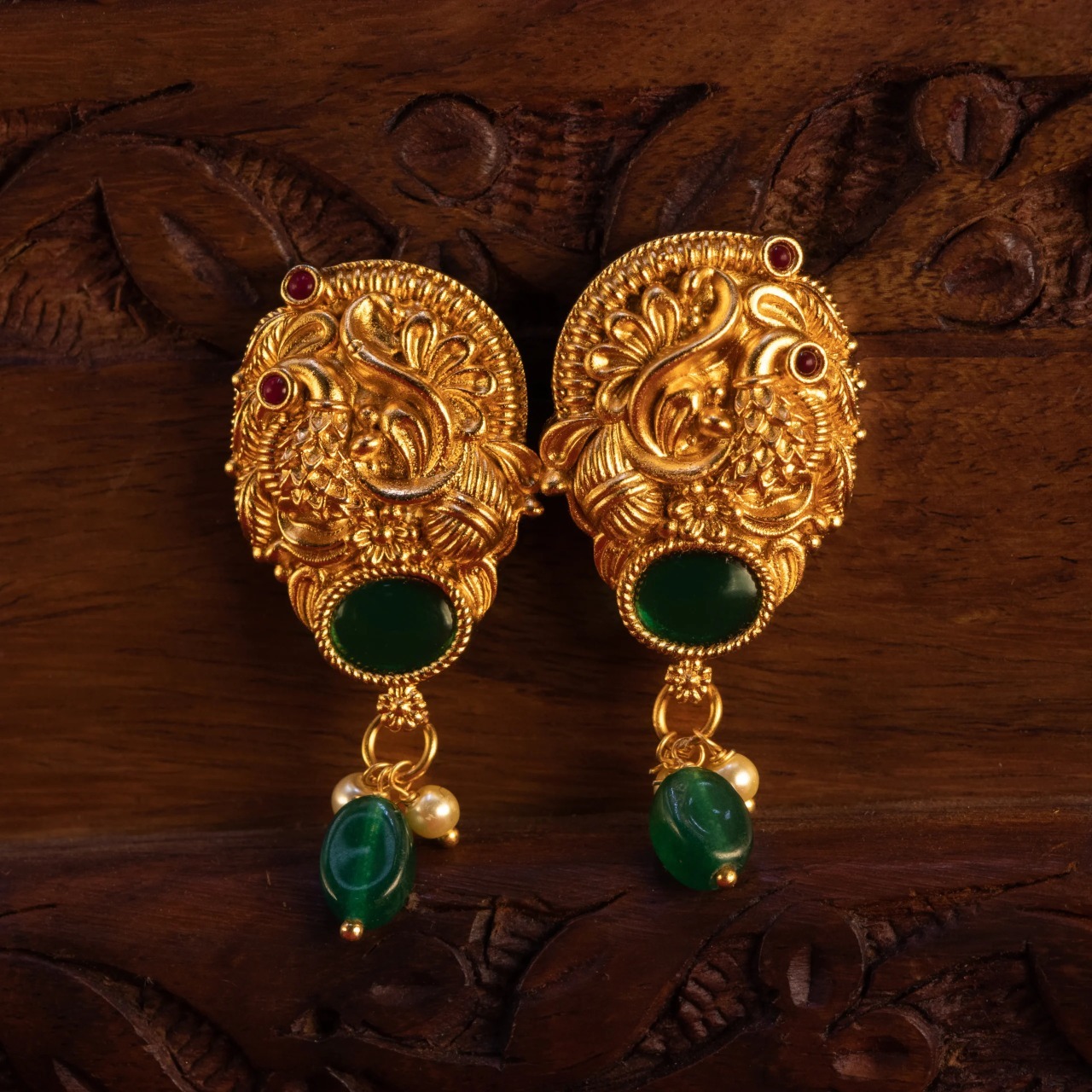 mat finish peacock with green kemp stone stud mat finish peacock with green kemp stone stud