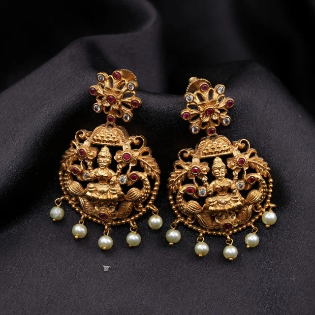 antique lakshmi earrings with peacock and floral bloom patterns antique lakshmi earrings with peacock and floral bloom patterns