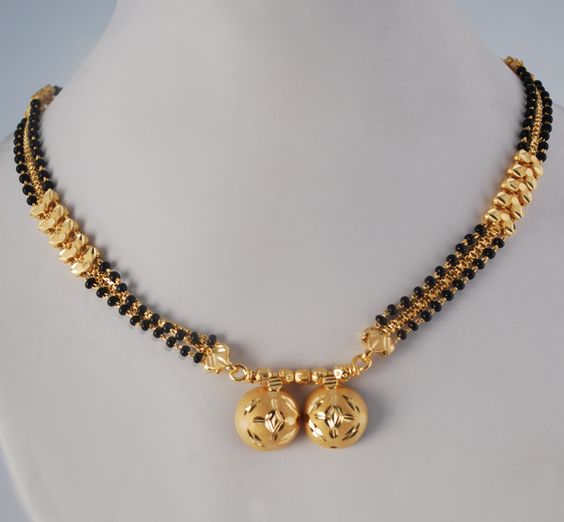 traditional black beads double layer chain with gold ball pendant traditional black beads double layer chain with gold ball pendant